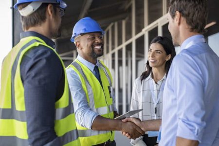 Image of a contractor and client shaking hands.