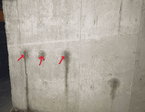 image of vertical cracks in basement wall