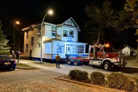 Photograph of Shield Foundation Repair moving a House to a new location.