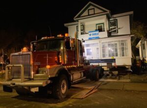 Photograph of Shield Foundation Repair moving a House to a new location.