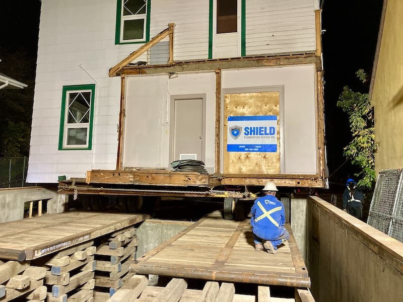 Photograph of Shield Foundation Repair moving a House to a new location.