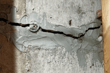 Image of cracked wall with poor foundation repair.