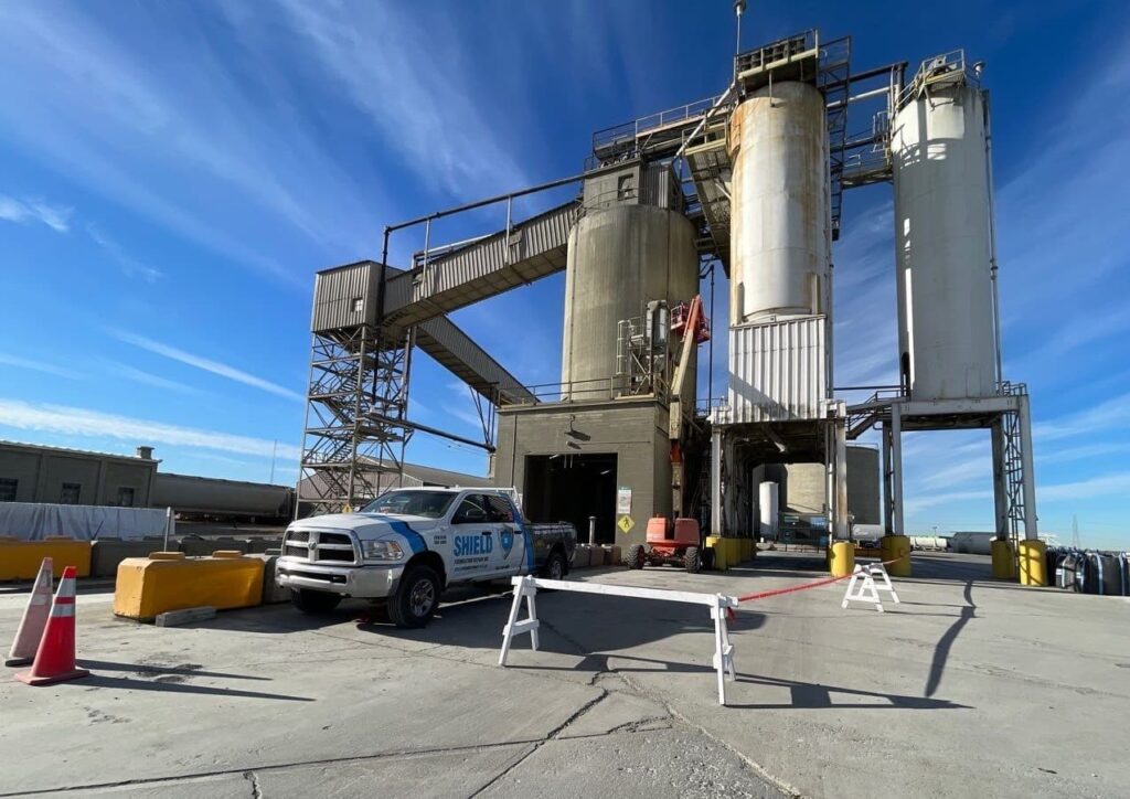 Image of Shield Foundation Repair working on the structural concrete of a silo.