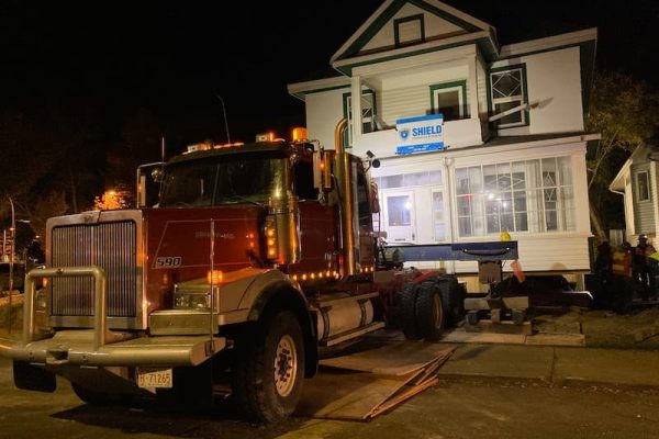 Photograph of Shield Foundation Repair moving a House to a new location.